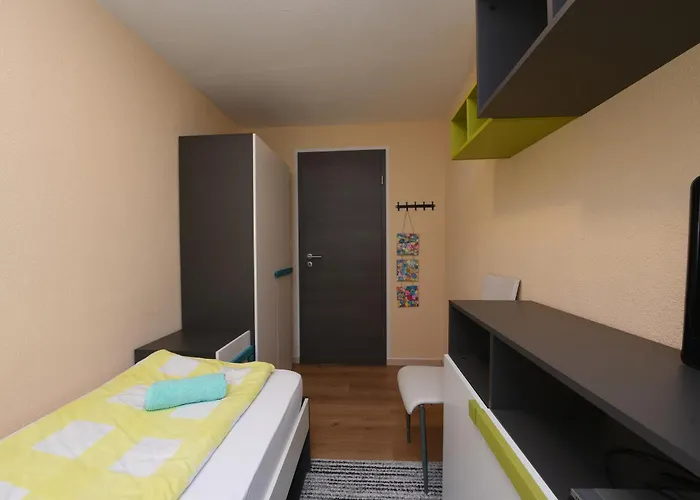 Nicole Apartman *